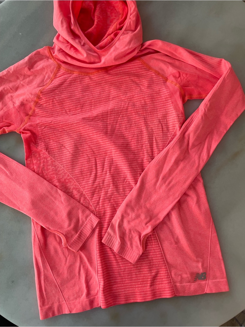 New Balance Women’s Coral Pink Hooded Long-Sleeve Performance Top